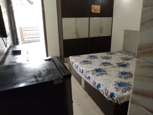 Bedroom in 1 RK Builder Floor at Vasant Apartments, Sector 13 – for Rent
