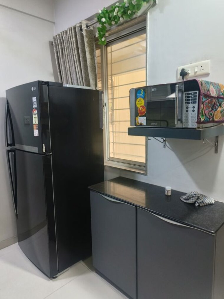 Kitchen, unique-blliss 2 Bedroom 1200 Sq.Ft. Apartment In Wakad Pune 10467940
