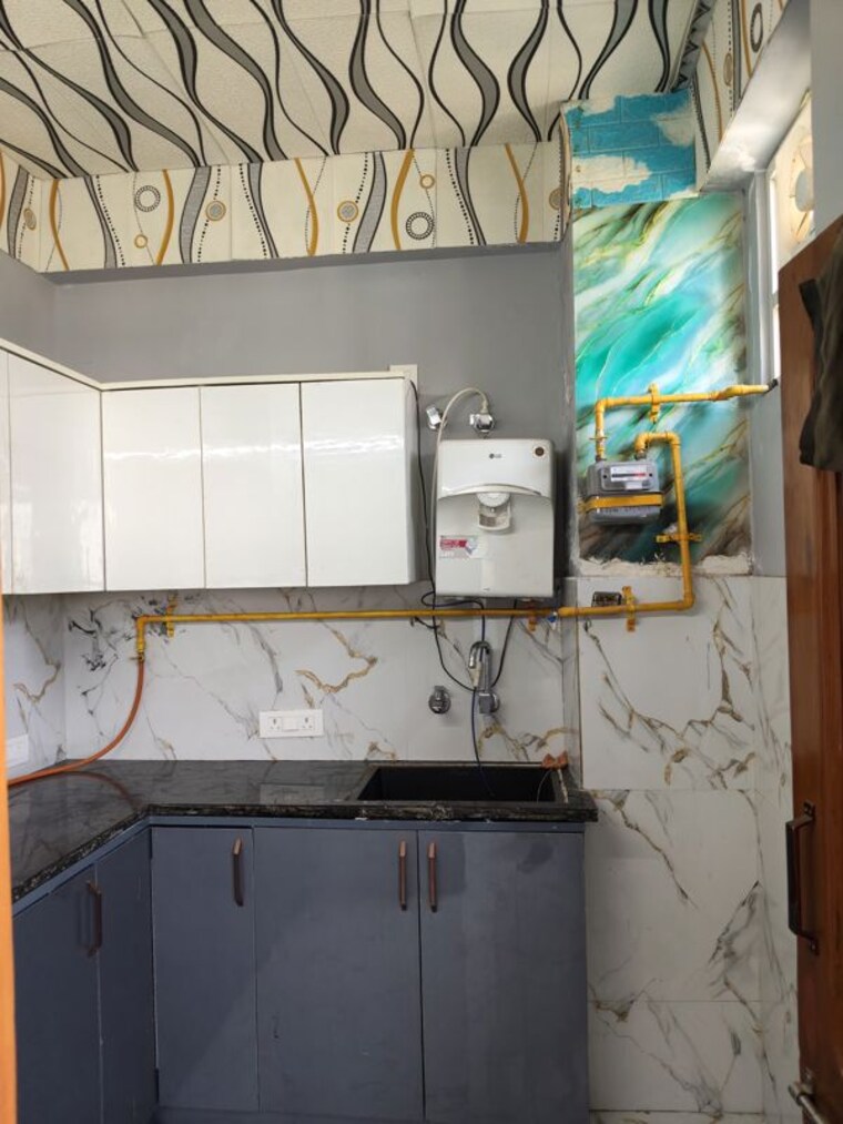 Kitchen, rwa-apartments-sector-71 1 Bedroom 550 Sq.Ft. Builder Floor In Sector 71 Noida 10467939