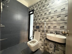 Bathroom in 3 BHK Apartment at Damji Shamji Mahavir Spring Tulip Phase 1, Pokhran Road No Two – for Rent