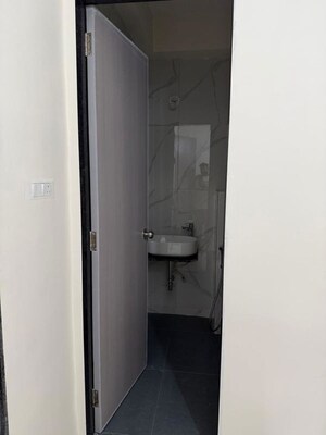 Bathroom in 3 BHK Apartment at Damji Shamji Mahavir Spring Tulip Phase 1, Pokhran Road No Two – for Rent