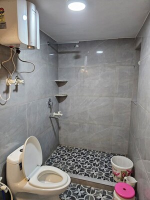 Bathroom in 1.5 BHK Builder Floor at RWA Apartments, Sector 31 – for Rent