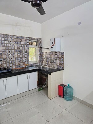Kitchen in 1.5 BHK Builder Floor at RWA Apartments, Sector 31 – for Rent
