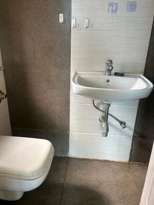 Bathroom in 1 BHK Apartment at Vijay Galaxy, Waghbil – for Rent