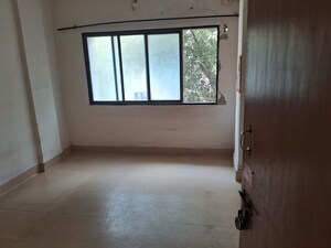 Room in 2 BHK Apartment at Romell Diva, Malad West – for Rent