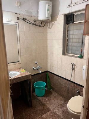 Washroom in 2 BHK Apartment at Palace Orchard CHS, Mohammadwadi – for Rent