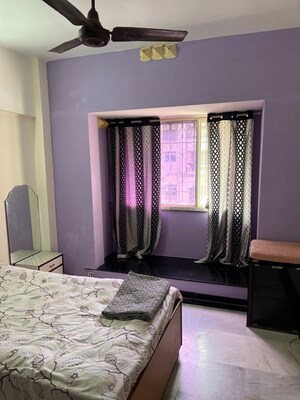 Master Bedroom in 2 BHK Apartment at Palace Orchard CHS, Mohammadwadi – for Rent