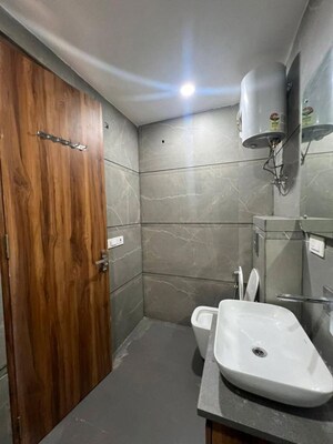 Bathroom in 1 RK Apartment at AKD Tower, Sector 14 – for Rent