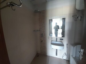 Bathroom in 3 BHK Builder Floor at Central Park Flower Valley, Sohna Sector 33 – for Sale