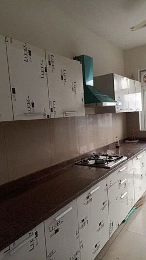 Kitchen in 3.5 BHK Apartment at Godrej Meridien, Sector 106 – for Rent