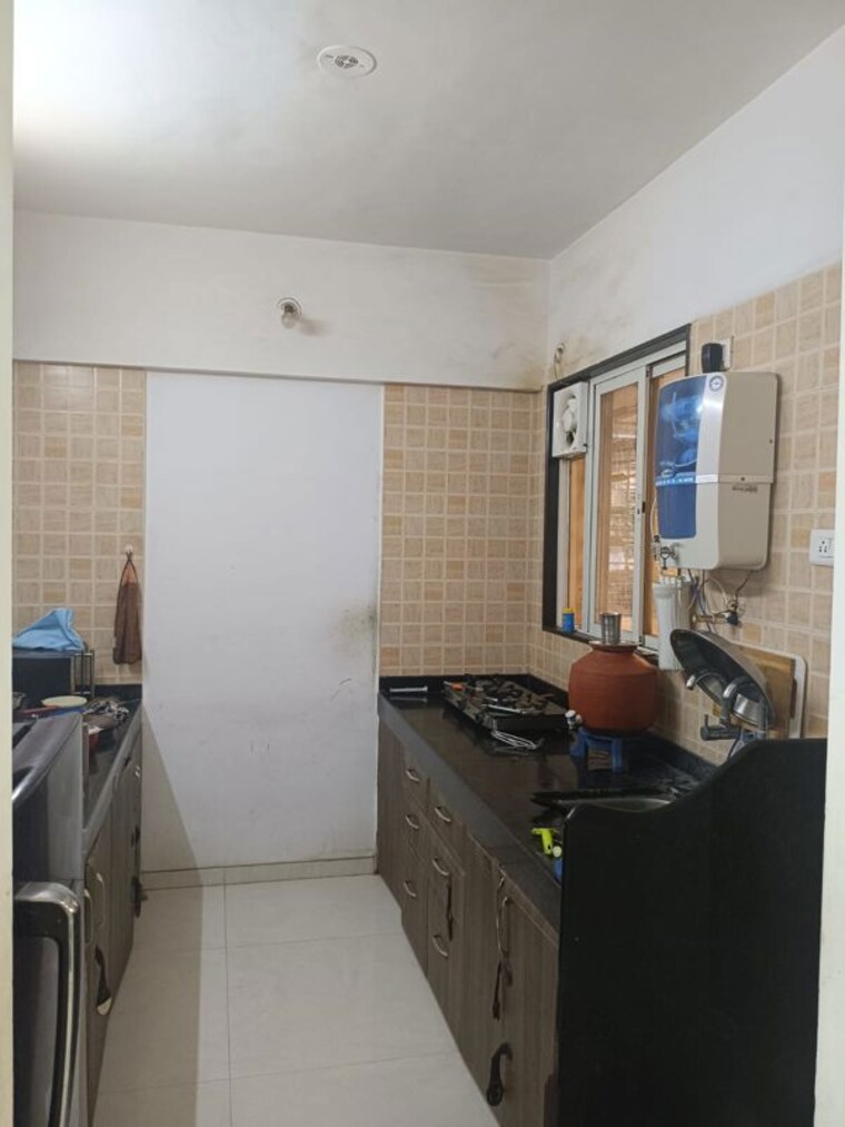 Kitchen, gk-rose-mansion 2 Bedroom 700 Sq.Ft. Apartment In Punawale Pune 10468293