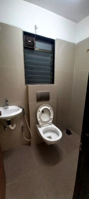 Bathroom in 1 BHK Apartment at Je And Vee Om Trimurti, Malad East – for Rent