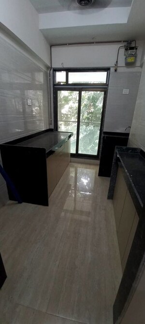 Kitchen in 1 BHK Apartment at Je And Vee Om Trimurti, Malad East – for Rent