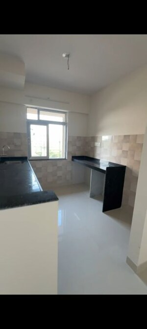 Kitchen in 2 BHK Apartment at Charms Global City, Ambernath East – for Sale