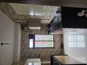 Kitchen in 2 BHK Apartment at  Rushi The Kollage Andheri, Andheri East – for Rent