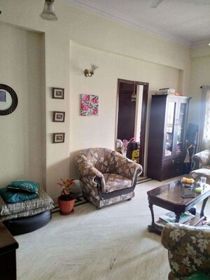 Living Room in 4 BHK Apartment at Hal 2nd Stage – for Sale