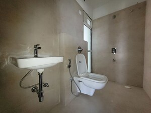 Bathroom in 1 BHK Apartment at Puranik City Reserva, Ghodbunder Road – for Rent
