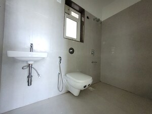 Bathroom in 1 BHK Apartment at Puranik City Reserva, Ghodbunder Road – for Rent