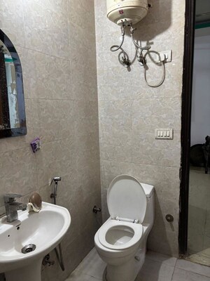 Bathroom in 2 BHK Builder Floor at Chattarpur – for Sale