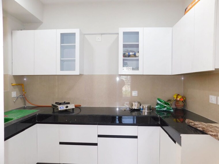 Kitchen, eldeco-live-by-the-greens 3 Bedroom 1404 Sq.Ft. Apartment In Sector 150 Noida 10468594