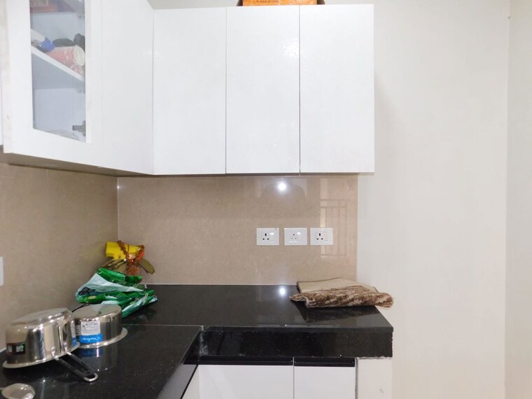Kitchen, eldeco-live-by-the-greens 3 Bedroom 1404 Sq.Ft. Apartment In Sector 150 Noida 10468594
