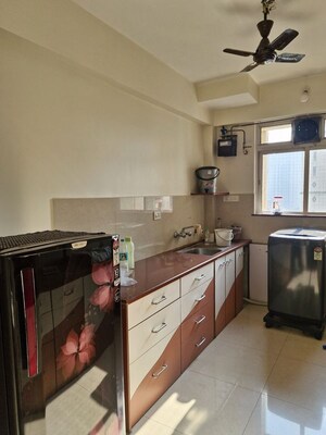 Kitchen in 2 BHK Apartment at Hiranandani Estate Winona, Ghodbunder Road – for Rent