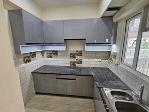 Kitchen in 2 BHK Apartment at Paramount Emotions, Sector 1 Greater Noida – for Rent