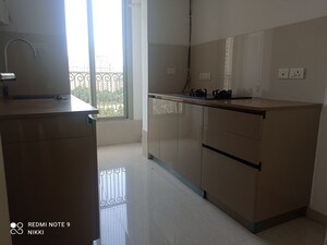 Kitchen in 1 BHK Apartment at Hiranandani Solitaire Studio Apartment, Ghodbunder Road – for Rent