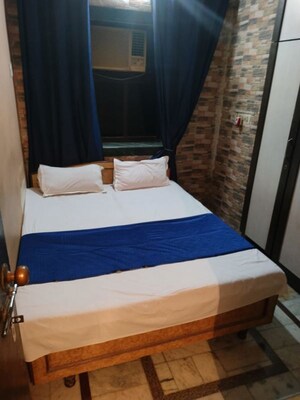 Bedroom in 2 BHK Apartment at Omkar Signet, Malad East – for Rent