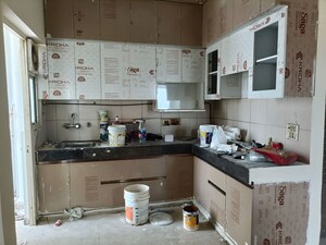 Kitchen in 2 BHK Apartment at Panchsheel Greens, Sector 16 Greater Noida – for Rent