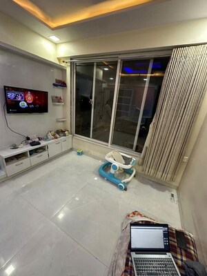 Living Room in 1 BHK Apartment at Ashar Maple Heights, Mulund West – for Rent