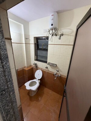 Bathroom in 2 BHK Apartment at Vasant Oscar, Mulund West – for Rent