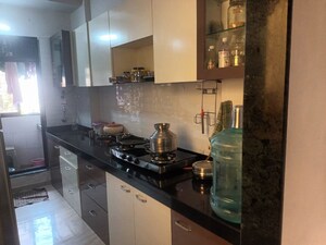 Kitchen in 2 BHK Apartment at RNA NG Paradise, Mira Road – for Rent