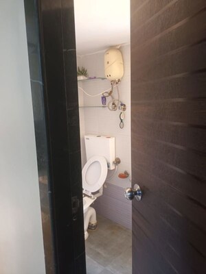 Bathroom in 2 BHK Apartment at RNA NG Paradise, Mira Road – for Rent