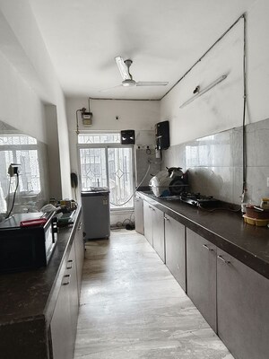 Kitchen in  Pg at Riddhi Gardens – for Rent