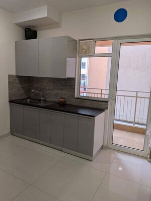 Kitchen in 2 BHK Apartment at Puri Emerald Bay, Sector 104 – for Rent