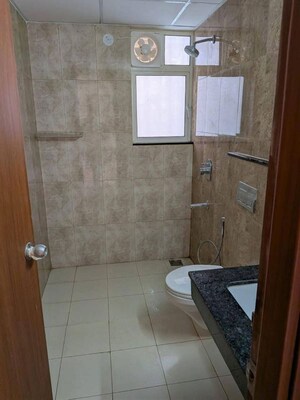 Bathroom in 2 BHK Apartment at Puri Emerald Bay, Sector 104 – for Rent