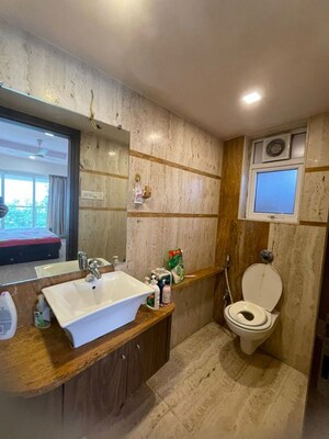 Bathroom in 4 BHK Apartment at Gym View, Khar West – for Rent