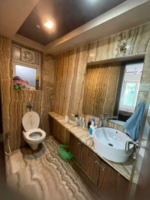 Bathroom in 4 BHK Apartment at Gym View, Khar West – for Rent