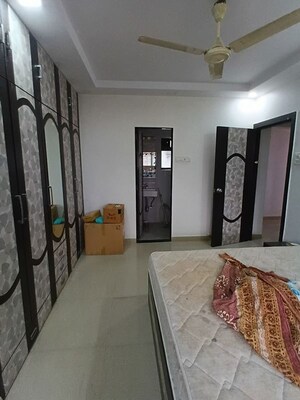 Bedroom in 2 BHK Apartment at Lokhandwala Whispering Palms, Kandivali East – for Rent