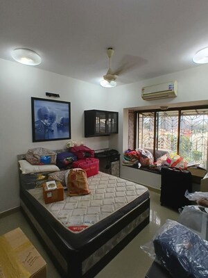 Bedroom in 2 BHK Apartment at Lokhandwala Whispering Palms, Kandivali East – for Rent