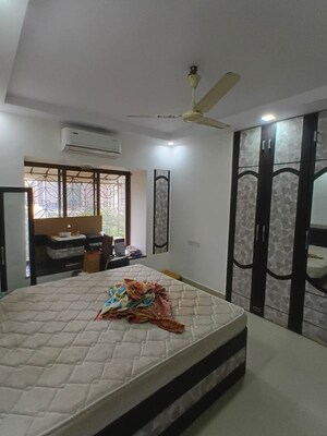 Bedroom in 2 BHK Apartment at Lokhandwala Whispering Palms, Kandivali East – for Rent