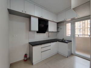 Kitchen in  Apartment at Bhartiya Nikoo Homes Phase 2, Thanisandra Main Road – for Rent