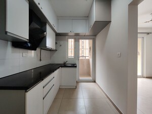 Kitchen in  Apartment at Bhartiya Nikoo Homes Phase 2, Thanisandra Main Road – for Rent