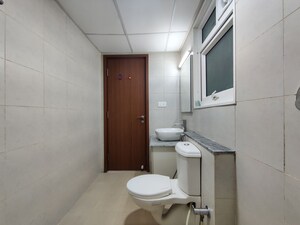 Bathroom in  Apartment at Bhartiya Nikoo Homes Phase 2, Thanisandra Main Road – for Rent