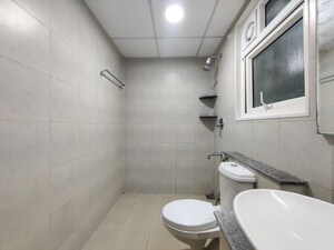 Bathroom in  Apartment at Bhartiya Nikoo Homes Phase 2, Thanisandra Main Road – for Rent