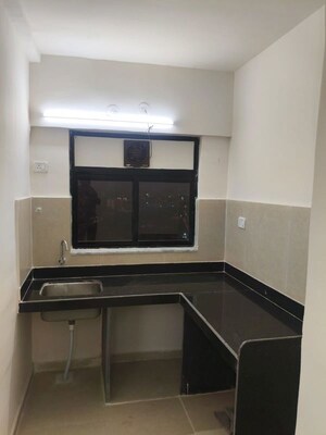 Kitchen in 1.5 BHK Apartment at Mehta Cornerstone, Kalyan West – for Rent