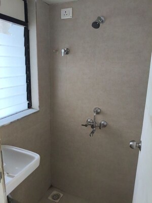 Bathroom in 1.5 BHK Apartment at Mehta Cornerstone, Kalyan West – for Rent