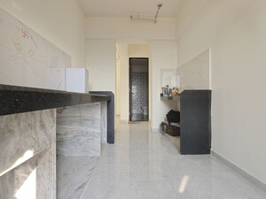 Kitchen in 2 BHK Apartment at Mahavir Kalpavruksha, Ghodbunder Road – for Rent