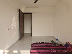 Bedroom in 2 BHK Apartment at Mahavir Kalpavruksha, Ghodbunder Road – for Rent